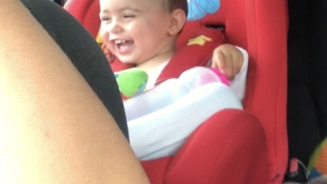 Cute baby full of laughs from a funny noise
