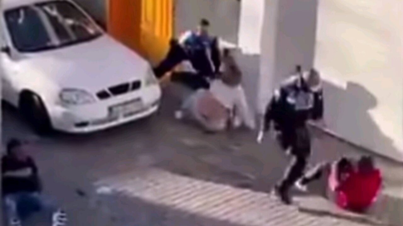 Spanish Police Assault Civilians