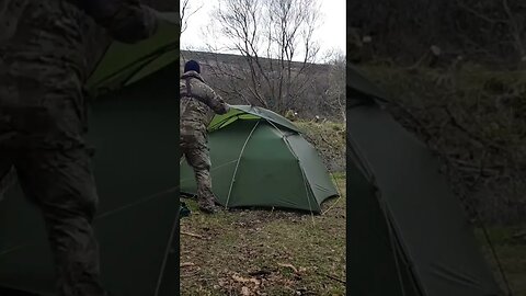 carefully removing the lid off the Naturehike Cloud peak 2 tent. in the wind Dartmoor