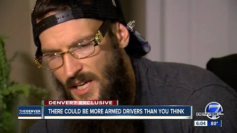 Man claims he was threatened by another Denver Uber driver with gun