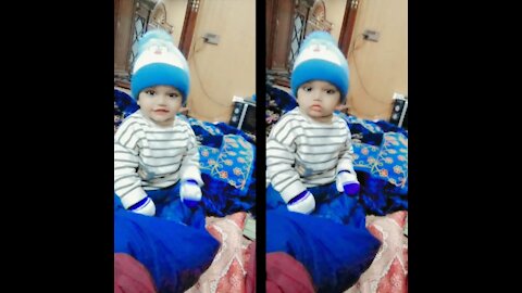 Rumble /Cute baby boy laughing instantly become serious for picture
