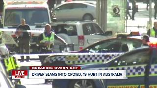 Driver arrested after slamming into crowd in Australia