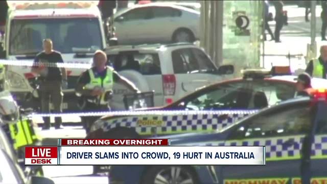 Driver arrested after slamming into crowd in Australia