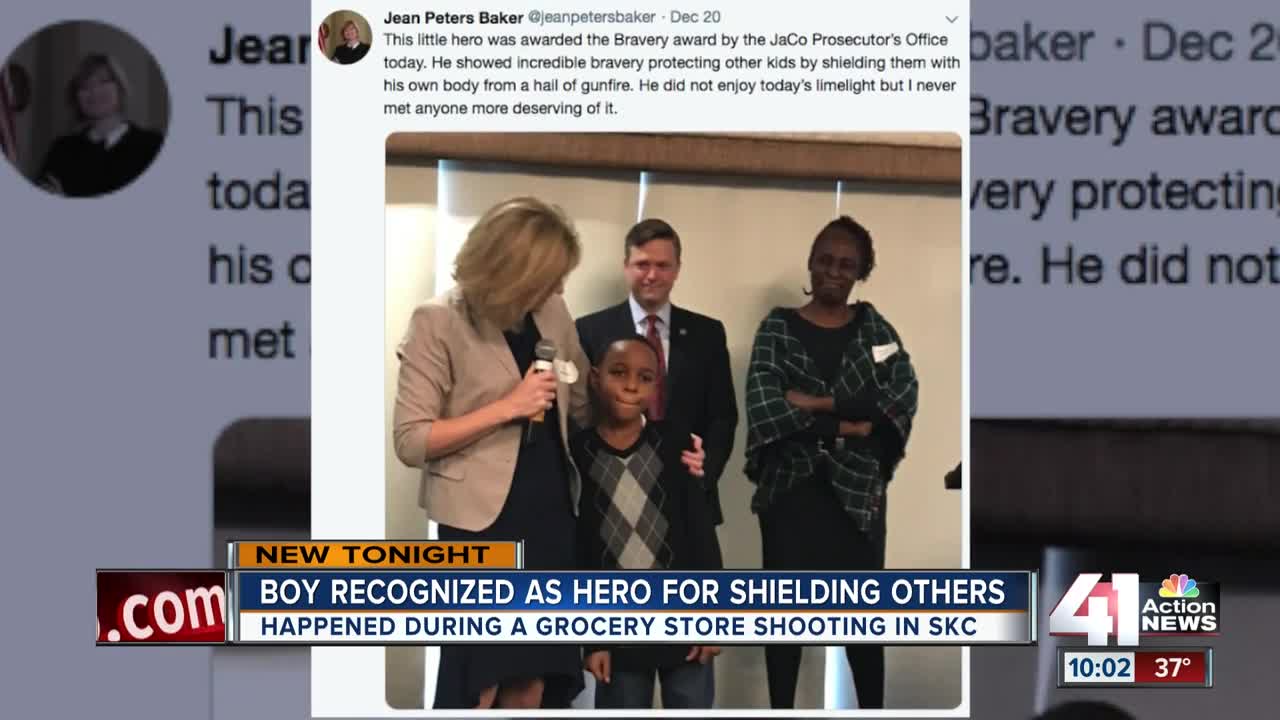 Boy given Hero Award for shielding others during gun battle