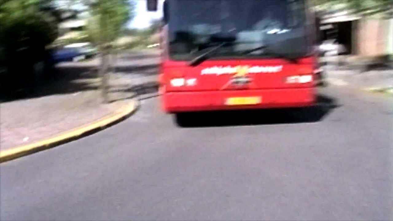 scooter almost crashes at bus