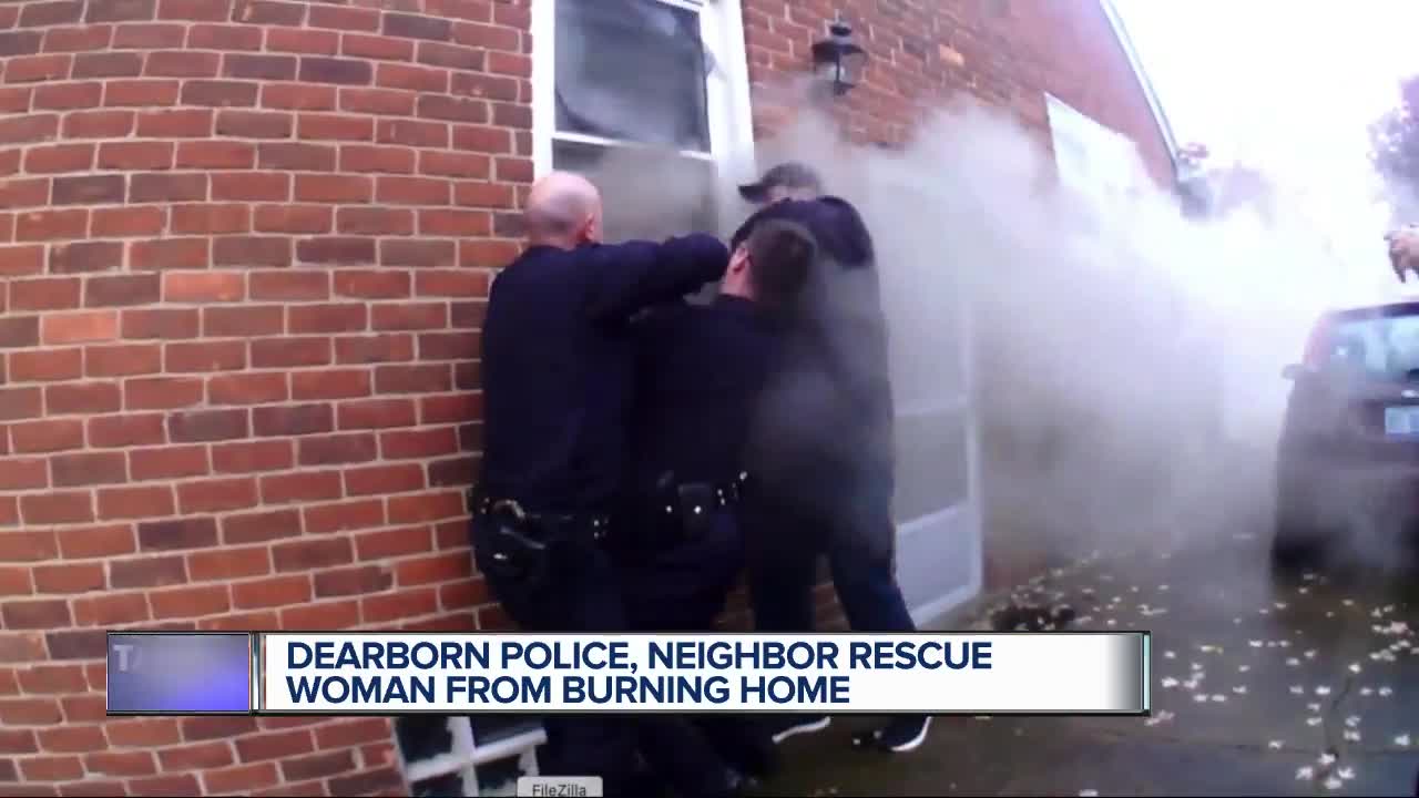 Video shows Dearborn officers rescue unconscious woman from burning home