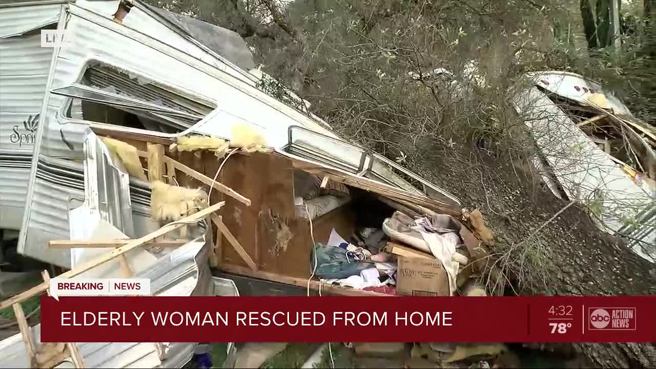 Large oak tree smashes into a Pasco County home, trapping elderly woman