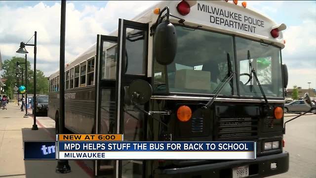 MPD helps stuff the bus for back to school