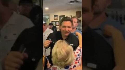 GOVERNOR Ron DESANTIS live hugs and kisses senior citizen supporter 10-16-22