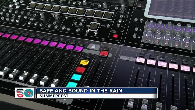 Summerfest sound equipment company working hard in the rain