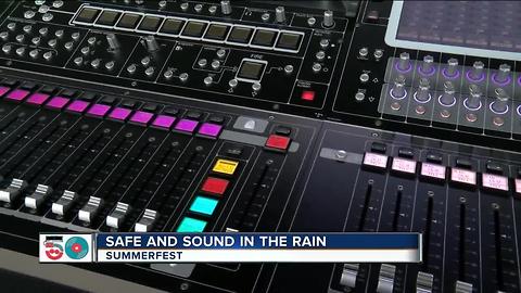 Summerfest sound equipment company working hard in the rain