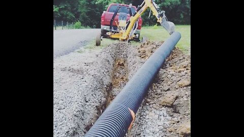 Preview of the culvert dig with the towable backhoe trencher