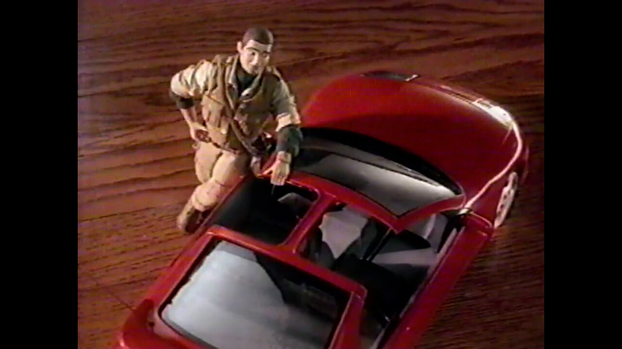 September 26, 1996 - Doll Takes Toy Nissan Out for a Wild Ride