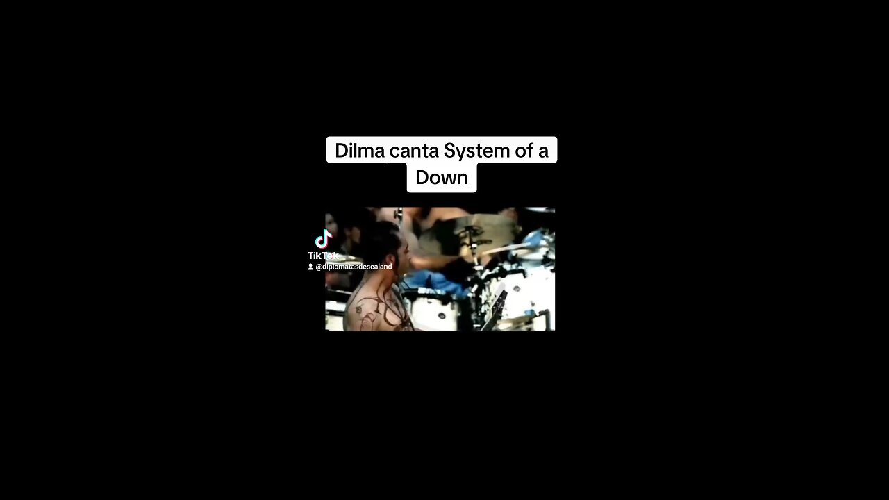 Dilma cantando System of a Down