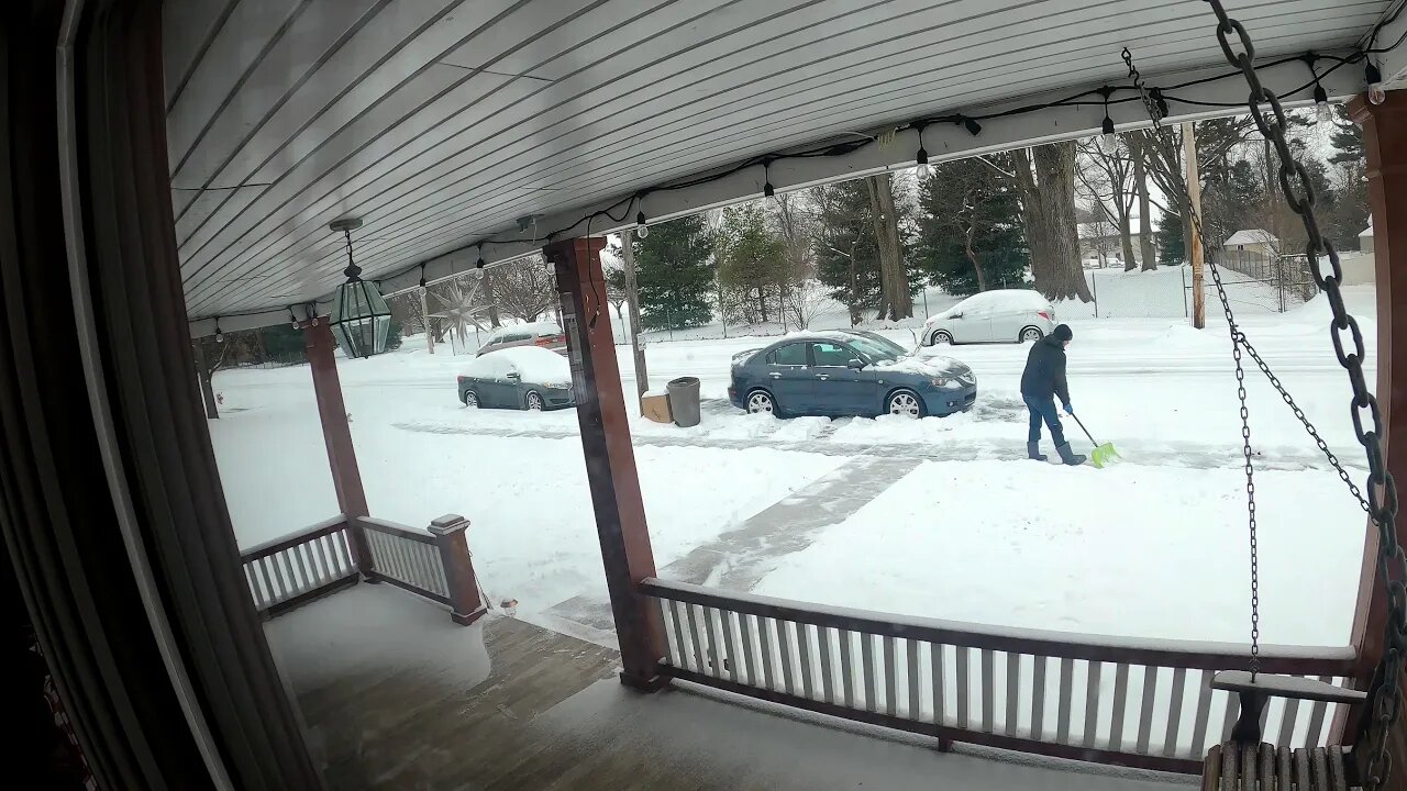 A Man Shoveling Snow