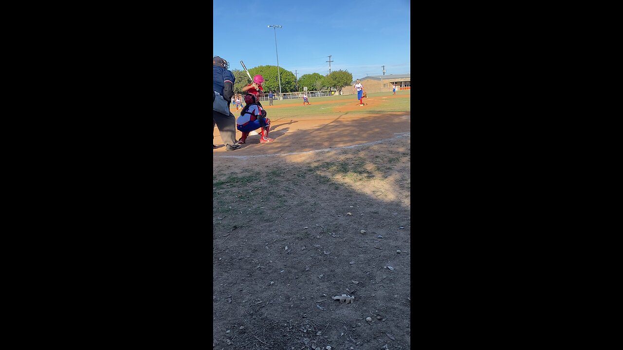 Our #11 with the big shot to right field in a bracket softball game.