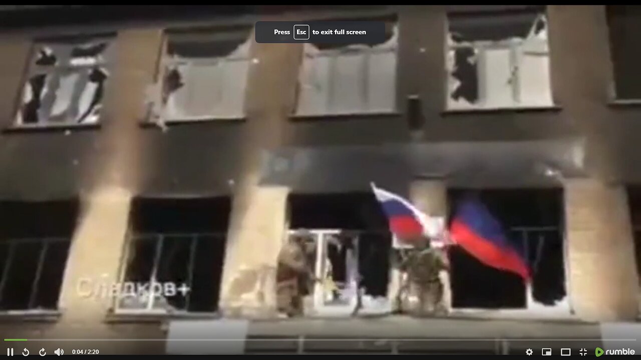 Mariupol Russian and DPR forces raise their flags over the Headquarters of the Azov Regiment 2022