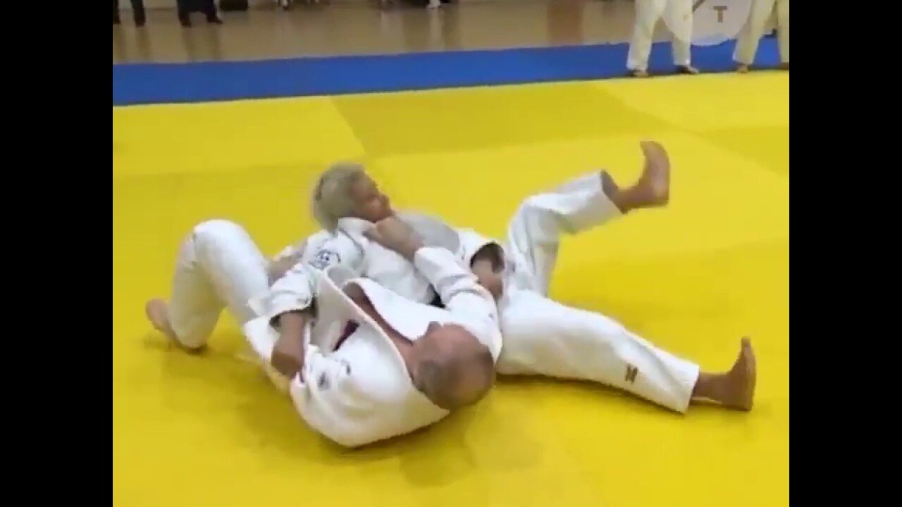 Putin Spars With Russian Judo Team Putin flashed his marital art skills while sparring judo team.