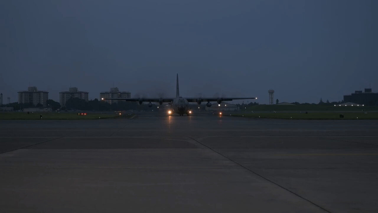 MG23: C-130H lands at Yokota Air Base (BRoll)