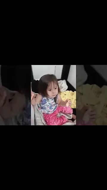 Baby Cassie is watching Peppa Pig