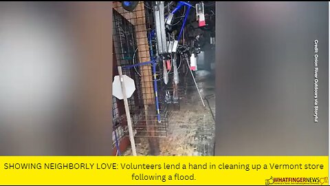 SHOWING NEIGHBORLY LOVE: Volunteers lend a hand in cleaning up a Vermont store
