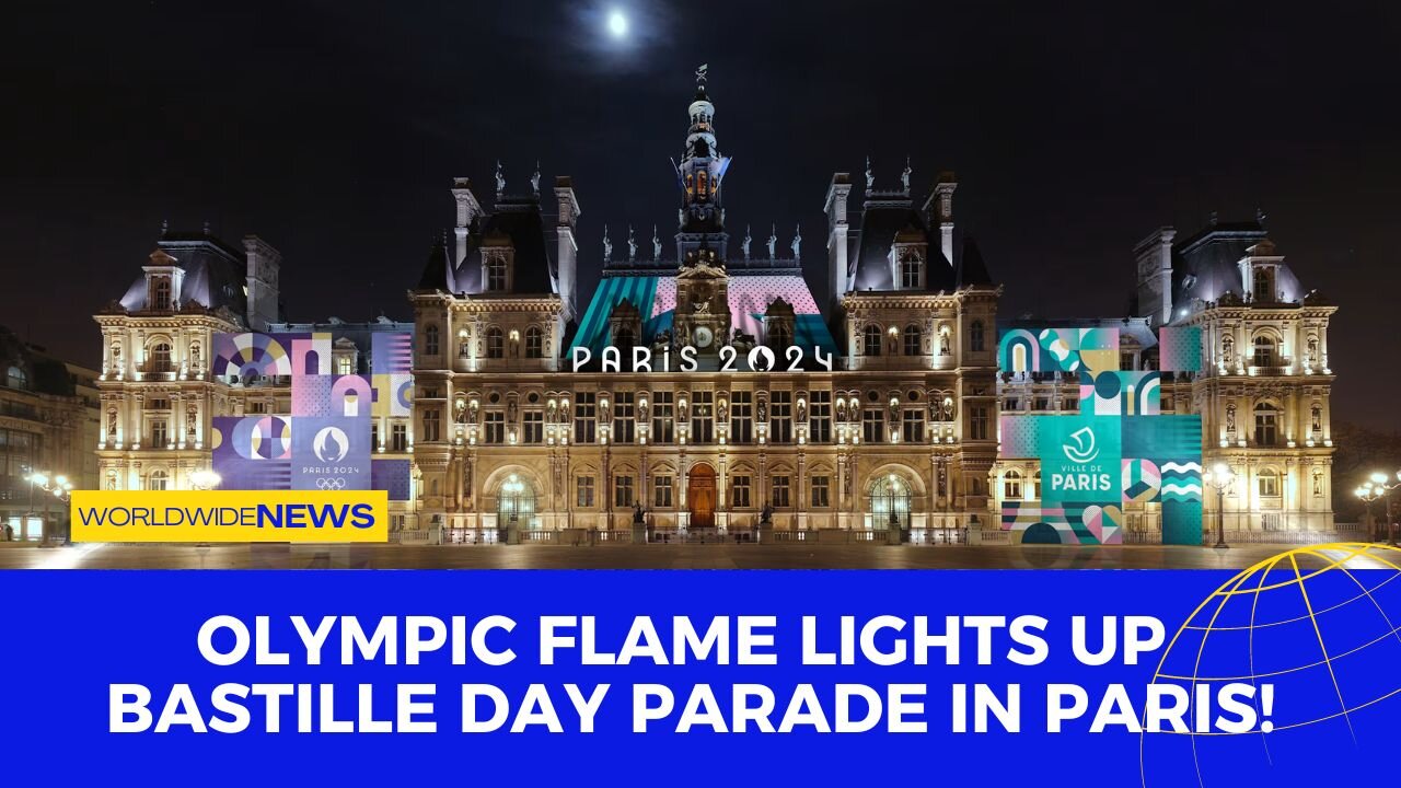 Olympic Flame Lights Up Bastille Day Parade in Paris!