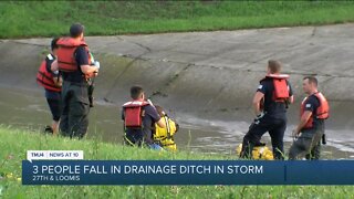 1 kid, 2 adults missing after falling in drainage ditch in storm