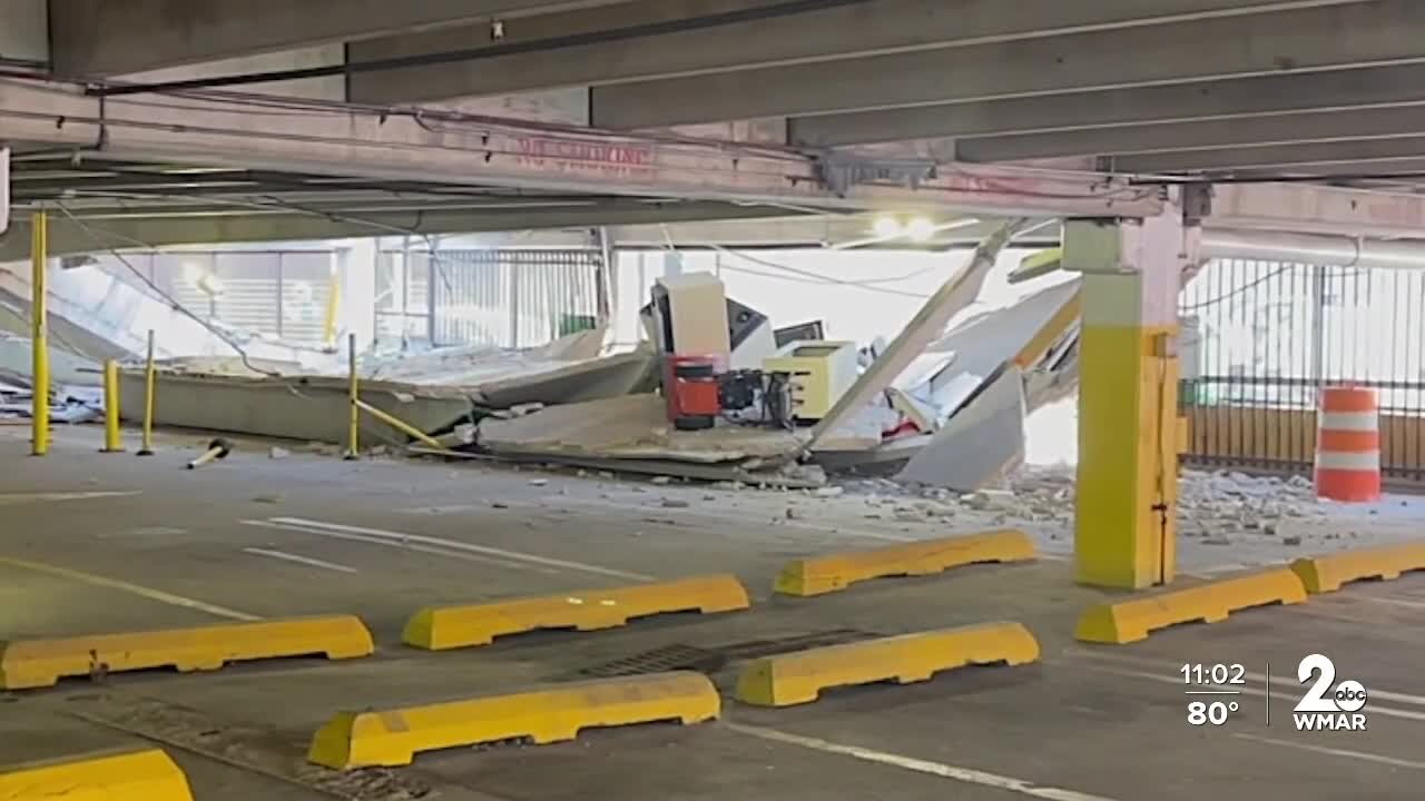 Engineers assess damage after parking garage collapse