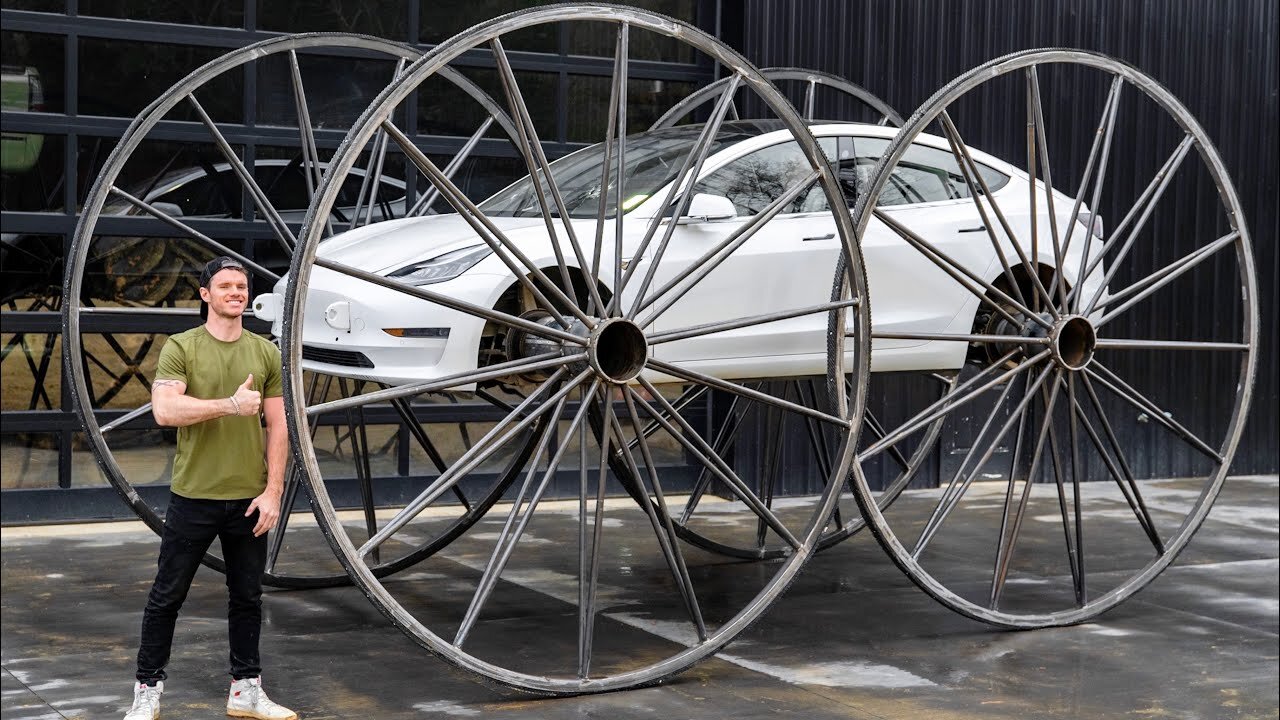 Driving A Tesla Upside-Down (10ft Tall Wheels)