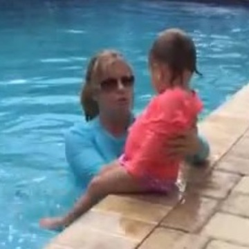 Baby falls into pool and back floats on her own!
