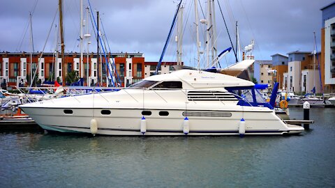 A luxury yacht moored in the middle of the city