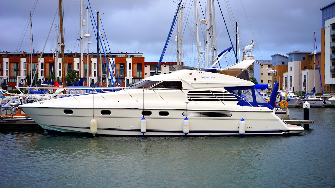 A luxury yacht moored in the middle of the city