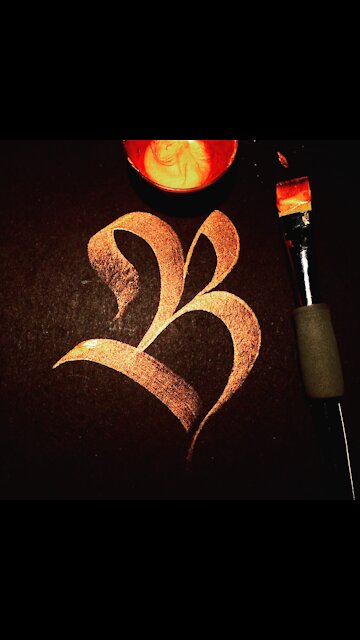 Calligraphy letter B with a brush