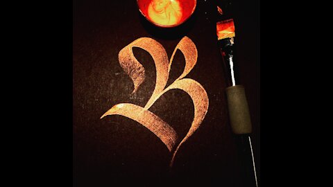 Calligraphy letter B with a brush