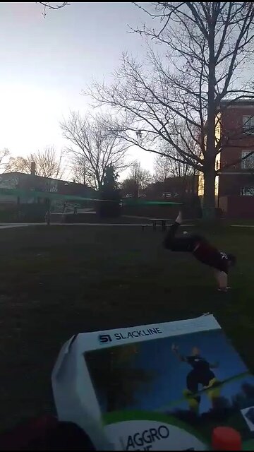 Slackliner eats dirt after attempting new trick