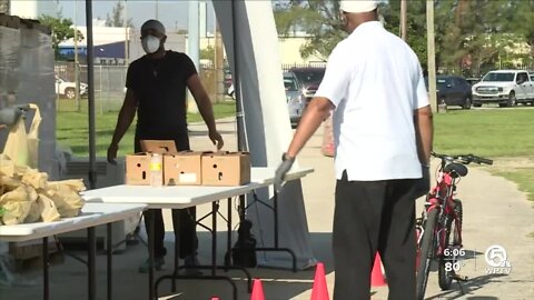 Food distribution draws in crowds hours before it begins in West Palm Beach