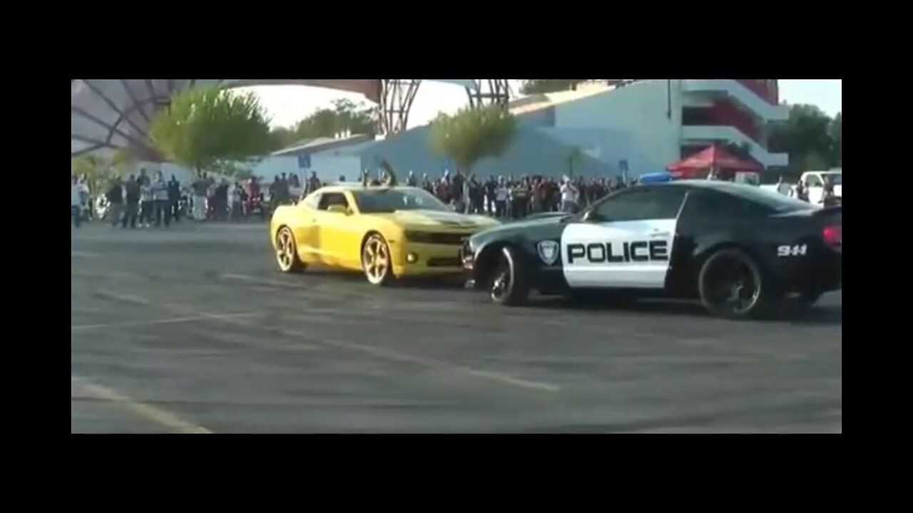 Drifting with the police car. Amazing Cars show on the street.