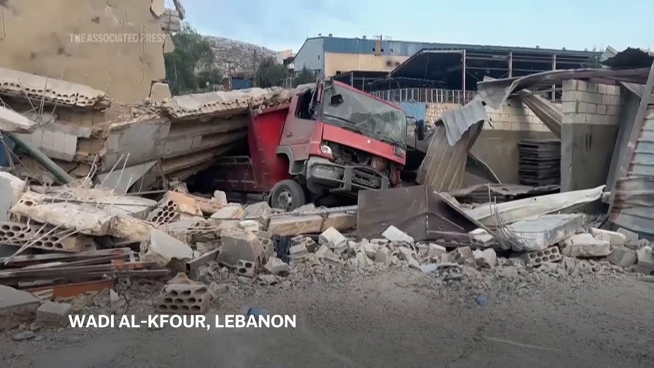 Relatives weep as Israeli strike in southern Lebanon kills several, including woman and her children