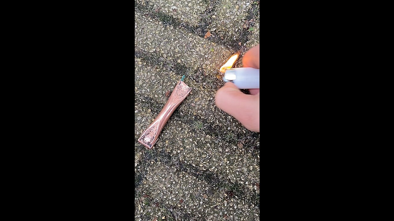 Lighting a copper pipe explosive and watch it fly away