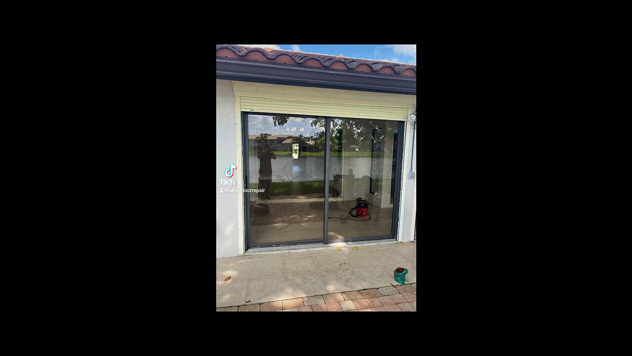 Sliding glass door repair; roller replacement and track refurbishing, in Deerfield Beach, Fl.