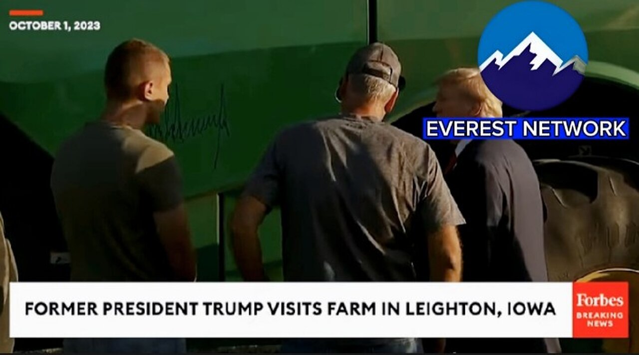 WATCH: Trump Visits Farm In Leighton, Iowa, Signs John Deere Combine