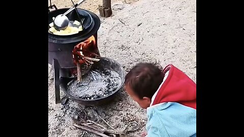 Poor area kid have to cooking for hisself