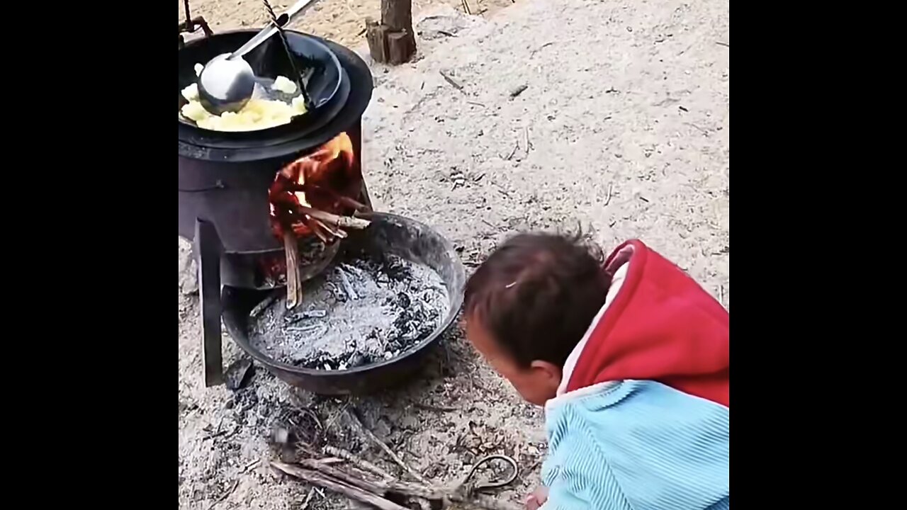 Poor area kid have to cooking for hisself