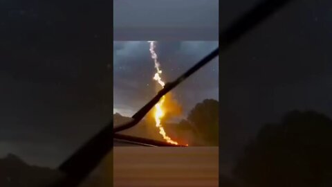 Truck struck by lightning while driving in front of his wife!😳#crazyvideo #lightingstrike #shorts