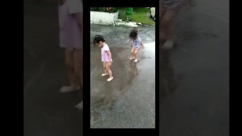 Twin Babies enjoy Rain #twin #babies #cute #