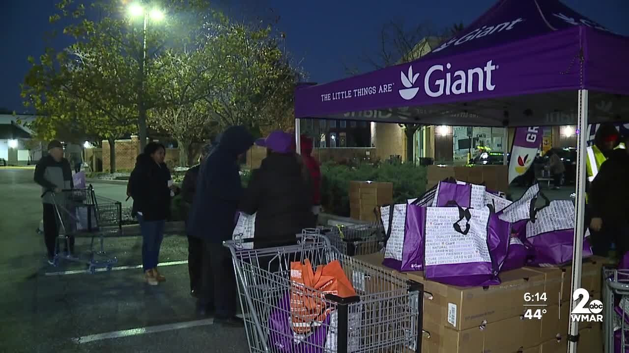 Dozens brave the cold for free turkey, pie at new Giant in South Baltimore