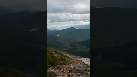 Paragliding down Ben Nevis mountain Scotland