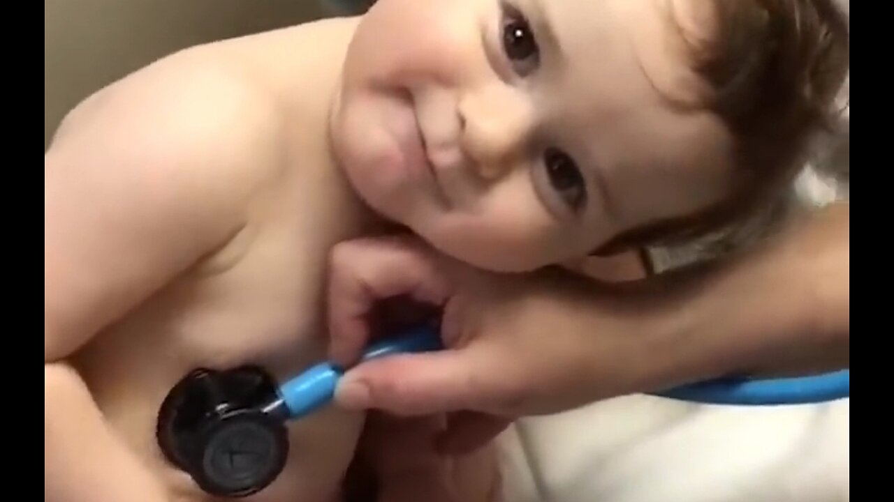 Adorable Baby Boy Cuddles on Nurse