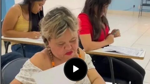 Watch how She ask are teacher to help her with message written on her leg.