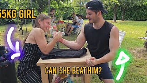 Girl beats guys in arm wrestling